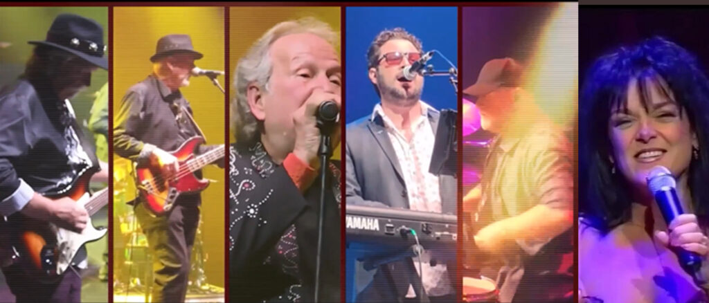 Six musicians, including Lisa Williams, performing live on stage as part of The Countdown Years show at Oakleigh Music Hall, featuring guitarists, a keyboardist, and vocalists under concert lighting.